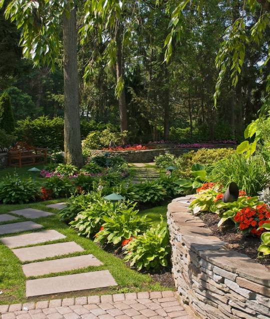 Riverwood Landscape of Kitchener = Beautiful garden with plants, flowers and trees for Landscaping design and maintenance services